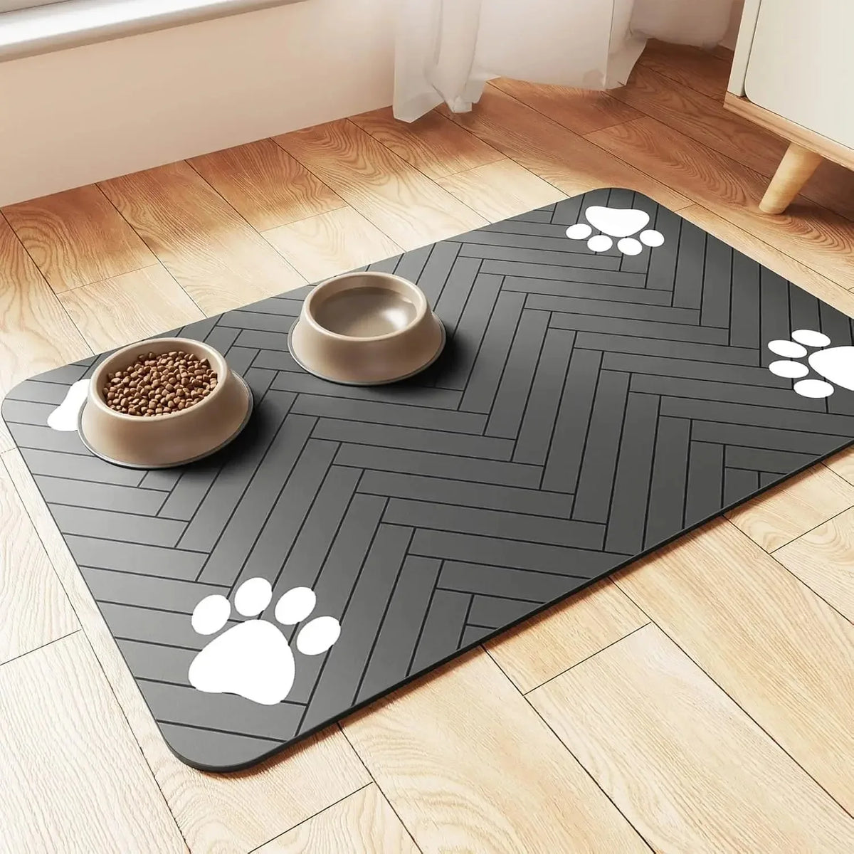 Alfombrilla absorbente para comedero