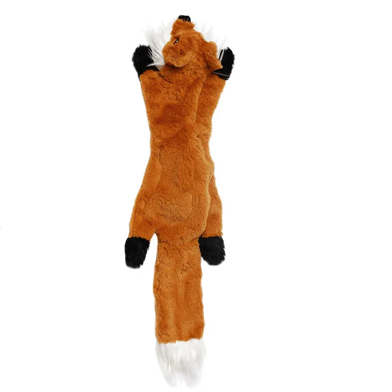 Dinosaurio de peluche para perros