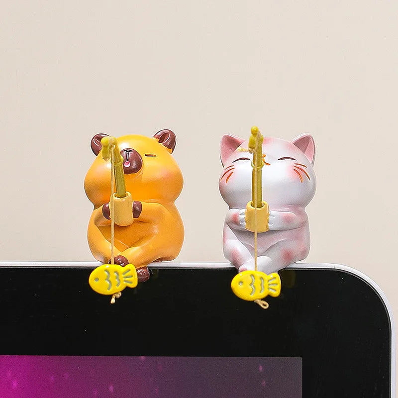 Figuritas pescadoras: gato, rana, panda y capibara