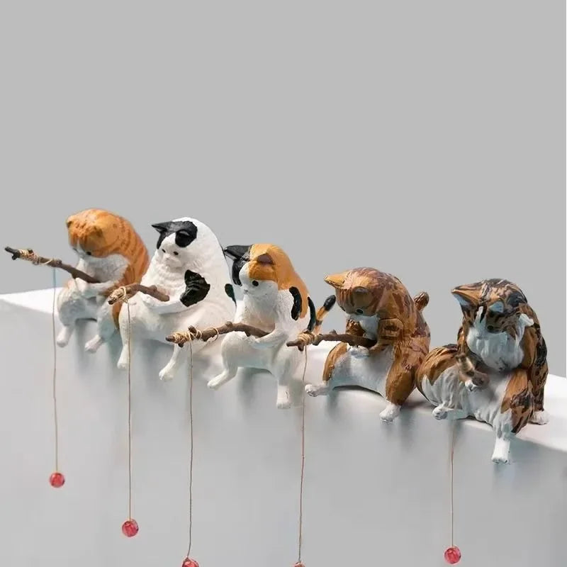 Figuritas de gatitos pescadores
