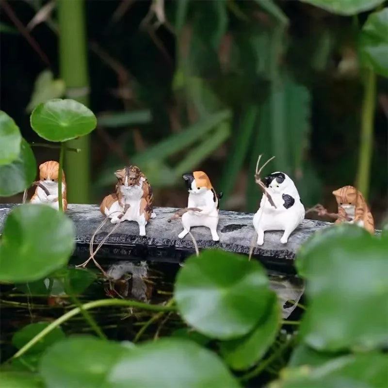 Figuritas de gatitos pescadores