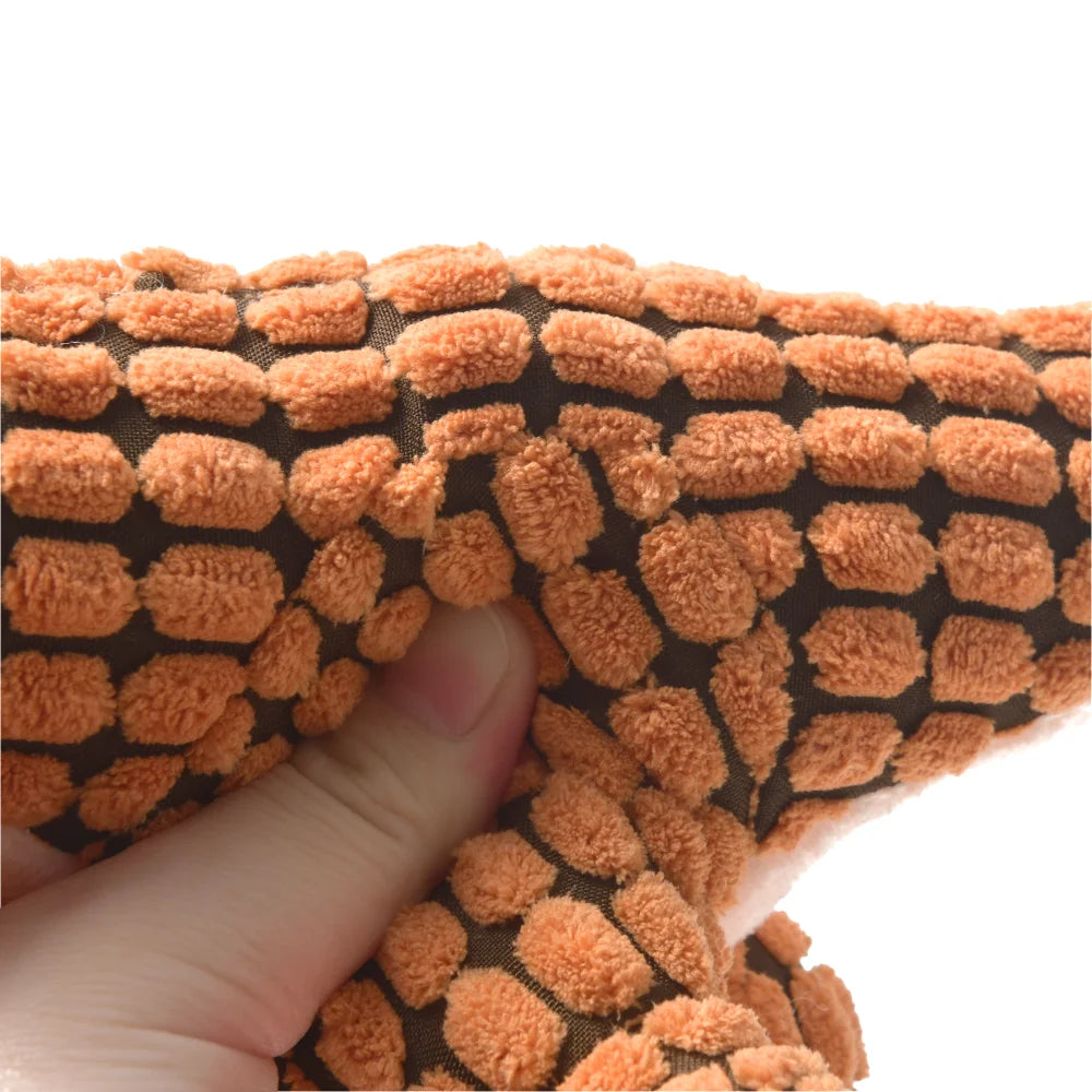 Dinosaurio de peluche para perros