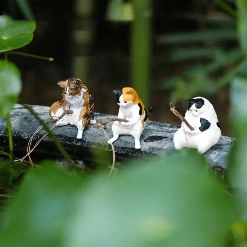 Figuritas de gatitos pescadores